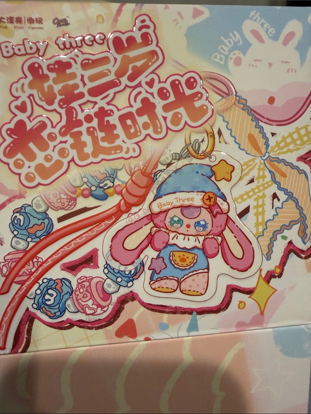 Baby three keychain confirmed